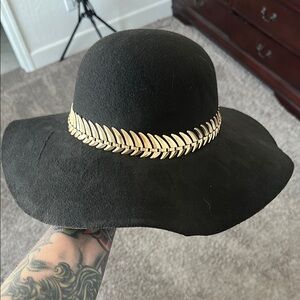 Elegant Black Wide-Brim Hat with Gold Accent